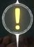 Focused crop of a floating exclamation alert marker above the tunnel entrance